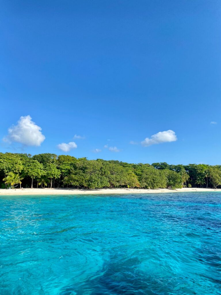 Fantasy Island Honduras beach with clear Caribbean water and a quiet tropical shoreline